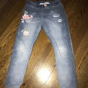 Jeggings with rhinestones and pink floral pattern